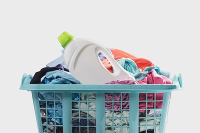 liquid detergent in clothes basket