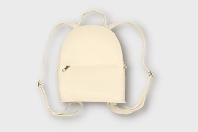 white leather bag turned yellow