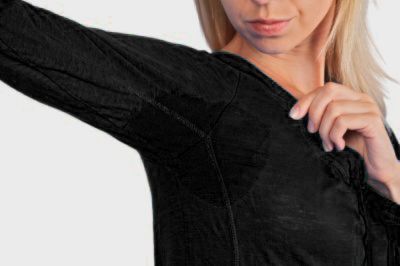 sweat stains on black shirt