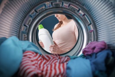 women checking laundry detergent 