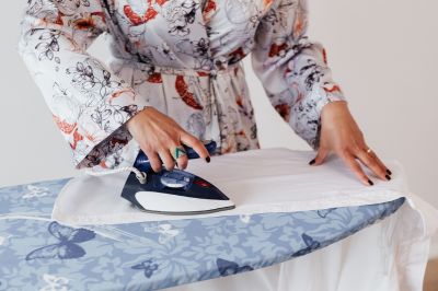 women ironing clothes