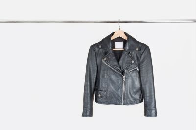 leather jacket hanging on hanger