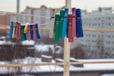snow covered clothes pins