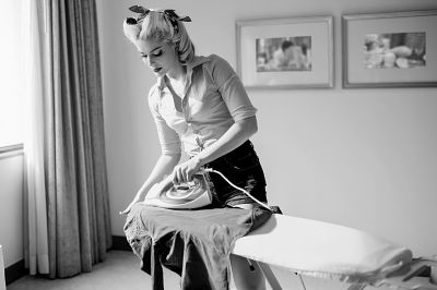 women ironing vintage clothes