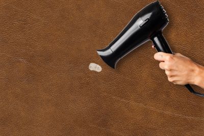 hair dryer method to remove gum from leather